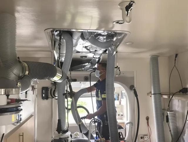 Ipswich Air Duct Cleaning specialist performing precise mobile home duct cleaning in Ipswich