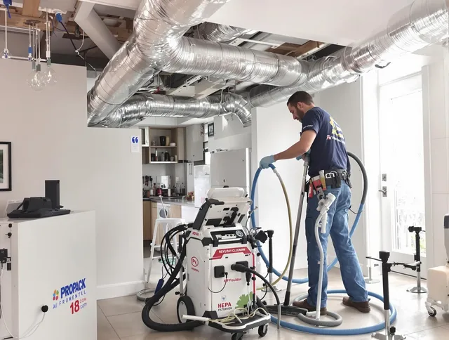 Ipswich Air Duct Cleaning technician performing advanced pure duct cleaning with specialized equipment in Ipswich