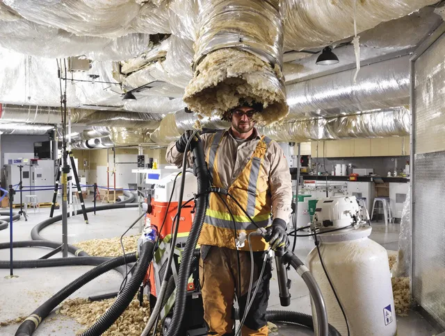 Professional vacuum insulation removal by Ipswich Air Duct Cleaning expert in Ipswich